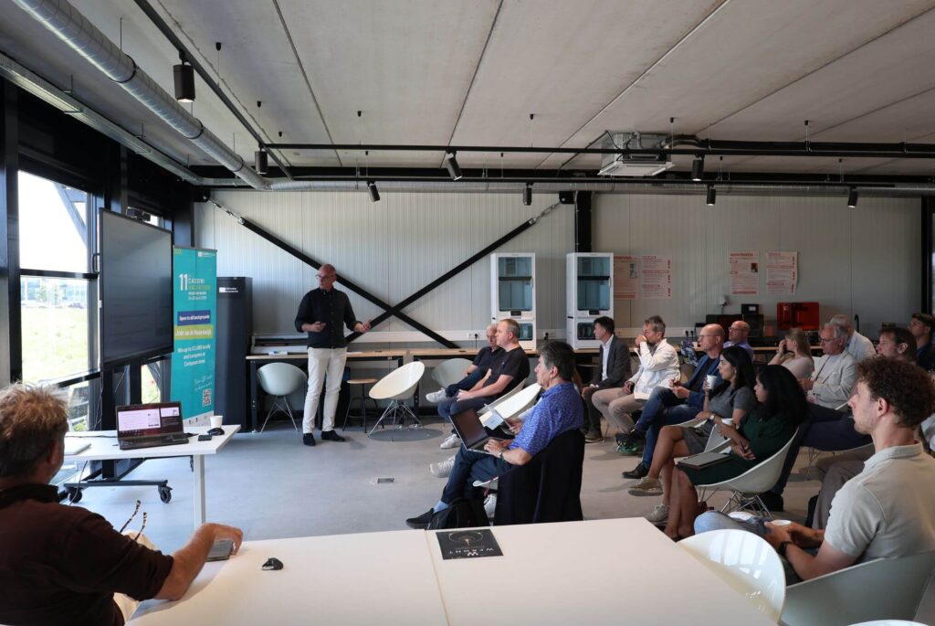 Participants attend a presentation on data, cloud, and AI sovereignty during a meeting of the Open Data Space Lab at the CometLab on the NL Space Campus
